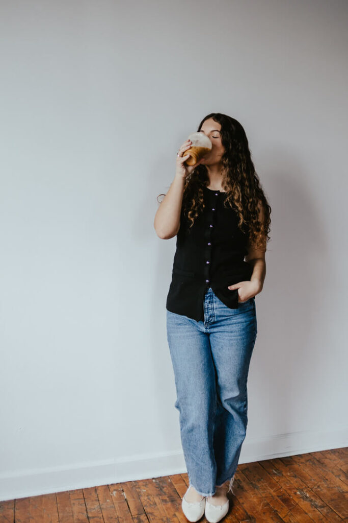 Woman drinking coffee in a coffee shop in Mechanicsburg, PA