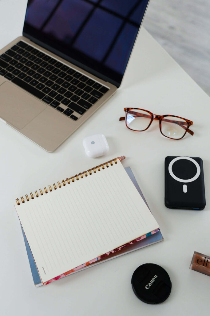 Social media manager tools, including a computer and journal