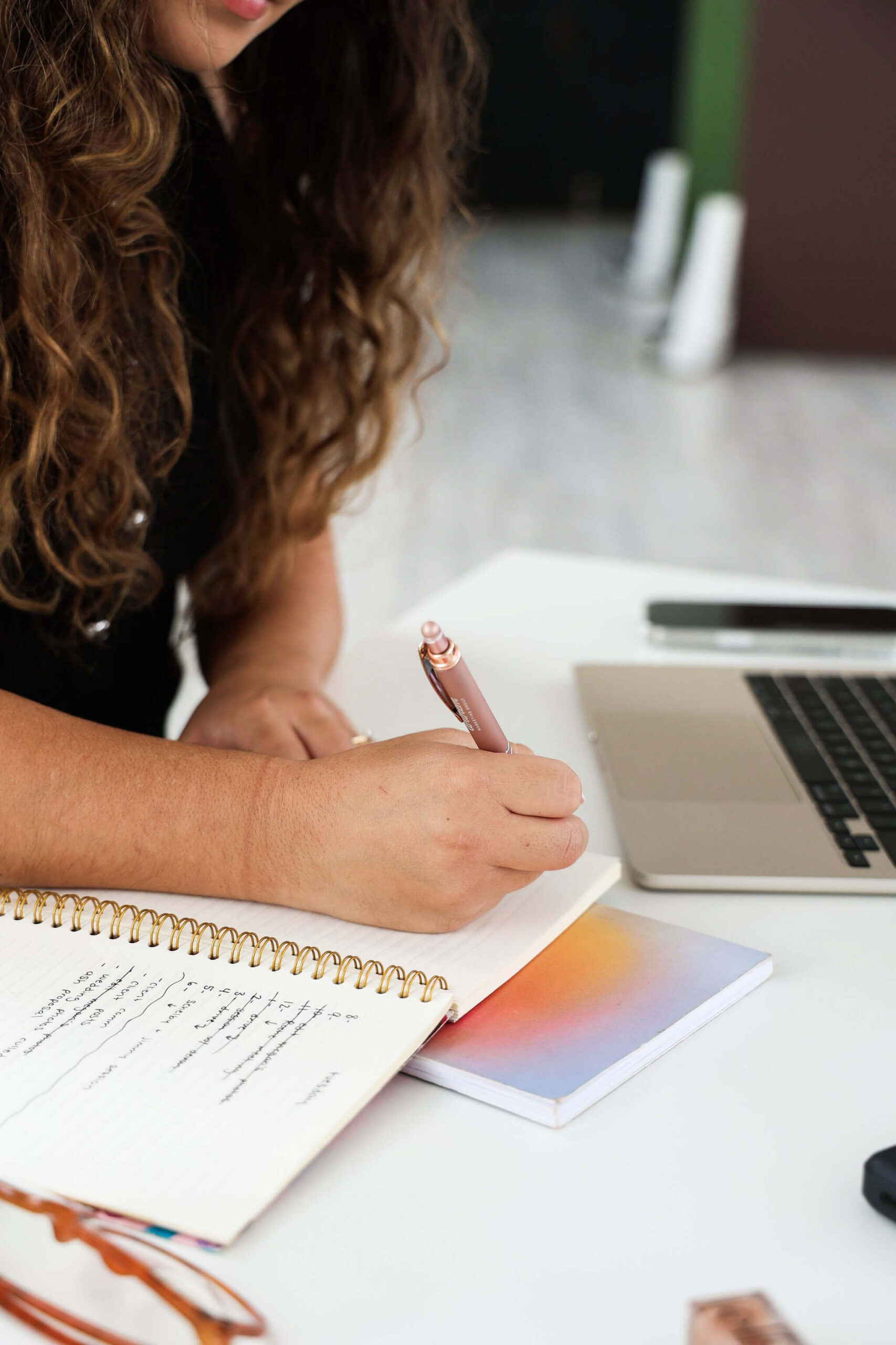 Female entrepreneur working remotely in a coffee shop